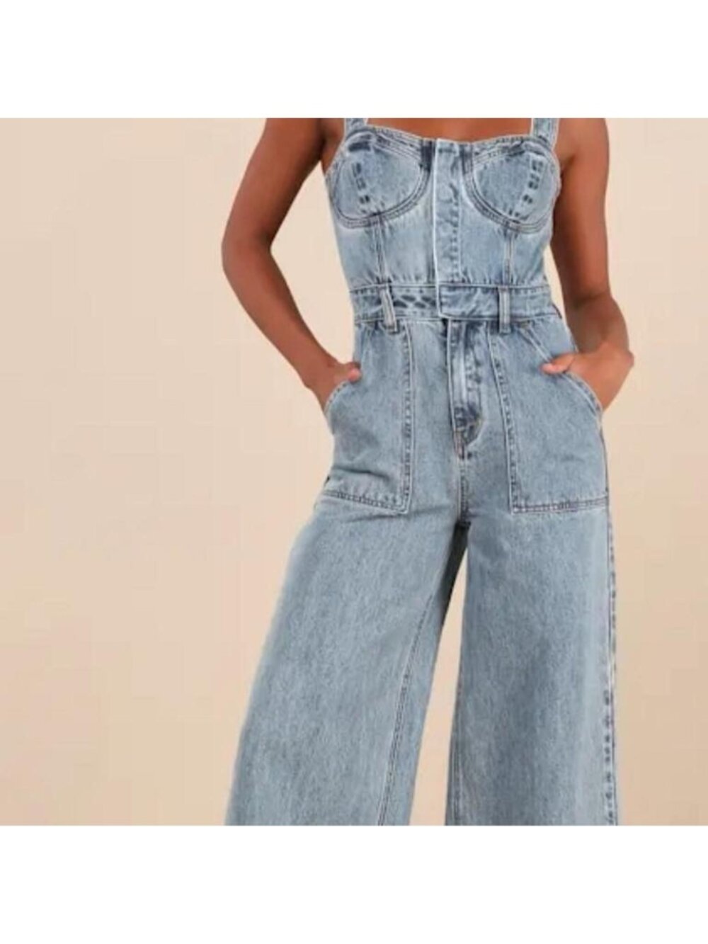Light blue denim overalls with adjustable straps and pockets
